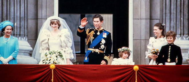 Charles and Lady Diana wave to the crowd on the balcony of Buckingham Palace on July 29, 1981, after the wedding ceremony.
