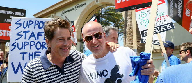 Actor Rob Lowe and his son, screenwriter John Owen Lowe, came to support the Writers Guild of America strike against Paramount Pictures studios, May 2, 2023.
