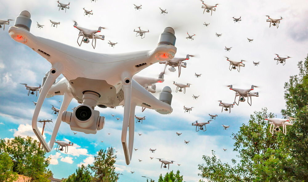 Versatile.  Deployed for example in enemy terrain, groups of thousands of drones coordinated by AI can perform reconnaissance, surveillance or attack missions autonomously. 