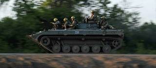 Des soldats ukrainiens en operation pres de la ville de Bakhmout, le 20 mai 2023. (C) Sergey SHESTAK / AFP
