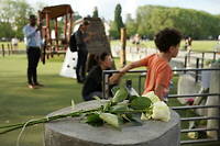 Roses lay at the playground after a knife attack Thursday, June 8, 2023 in Annecy, French Alps. A a man with a knife stabbed four young children at a lakeside park in the French Alps on Thursday, assaulting at least one in a stroller repeatedly. The children between 22 months and 3 years old suffered life-threatening injuries, and two adults also were wounded, authorities said. (AP Photo/Laurent Cipriani)/ANN121/23159616191927//2306081910